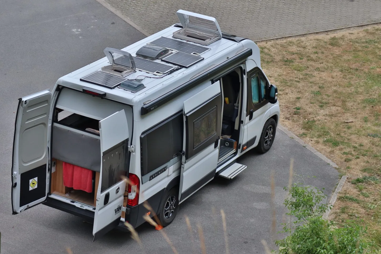 Rooftop solar on a camper van: size panels from your daily energy use, not from roof space alone.