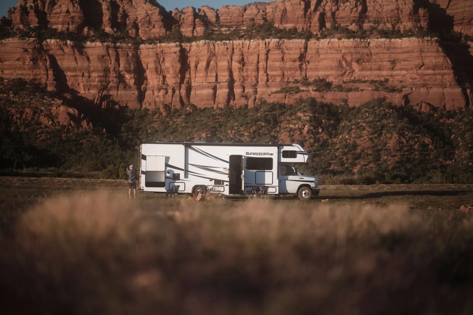 A quiet site below canyon walls: most of RV life happens between the travel days.