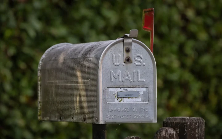 Metal US Mail mailbox with the flag down
