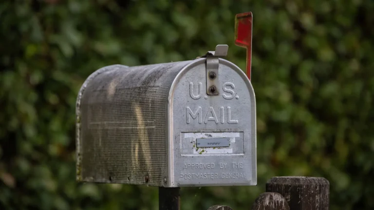 Metal US Mail mailbox with the flag down