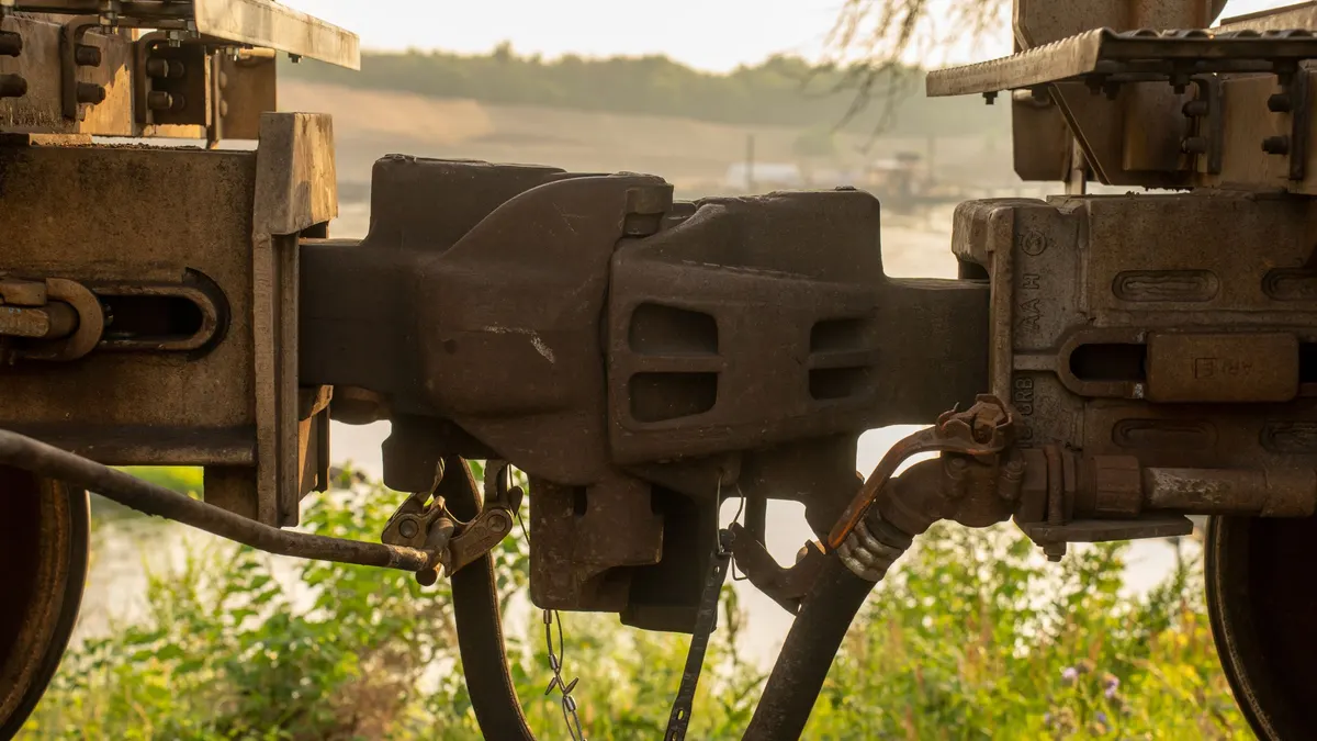 Close-up of a heavy trailer coupler and hitch hardware